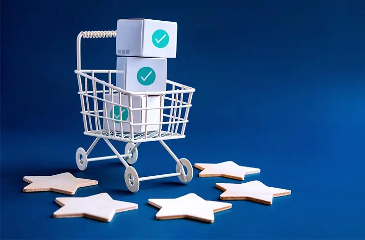 Shopping cart carrying boxes that display check marks, surrounded by five stars
