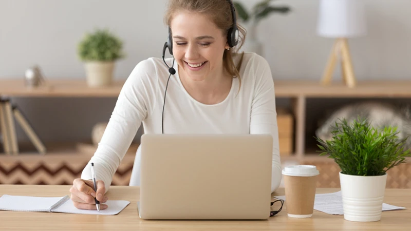 Customer care agent delivering support while working in a home office