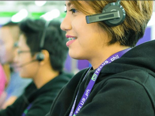 agent in a contact center on a headset
