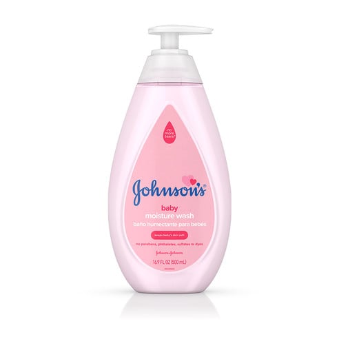 Pink bottle with pump dispenser labeled "Johnson’s baby moisture wash," featuring bilingual text for English and Spanish. The background is plain white, and the bottle stands upright.