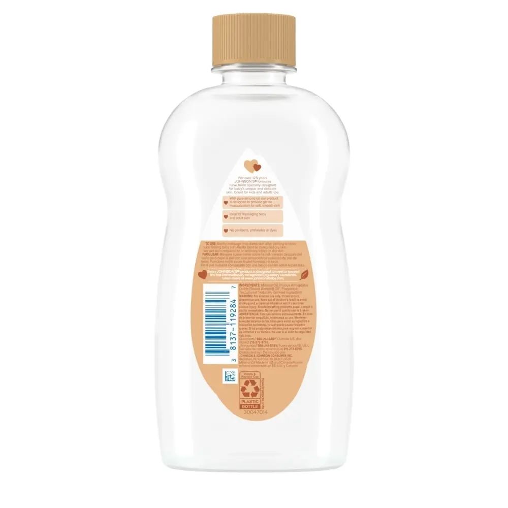 Back view of a bottle of moisturizing almond oil for dry skin, with a beige cap and detailed product information on the label.