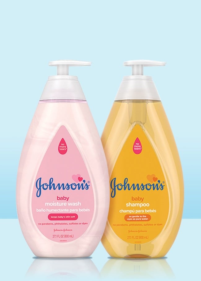 Two bottles with pump dispensers labeled "Johnson's." The left contains "baby moisture wash" (pink) while the right has "baby shampoo" (yellow). Both are 27.1 FL OZ (800 mL) and have "no more tears" labels above the brand name.