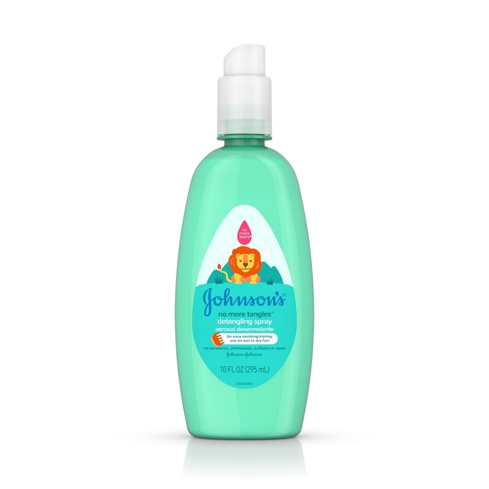 Johnson's Baby No More Tangles Detangling Spray bottle, 10 fl oz, with a green lion illustration on the label.