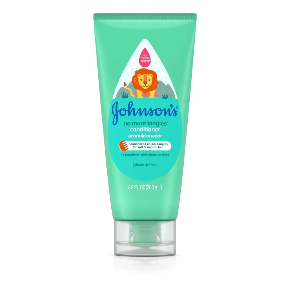 Johnsons Baby No More Tangles conditioner, 6.8 fl oz, with a lion illustration, suitable for smooth and easy-to-comb hair, free from parabens, phthalates, or dyes.