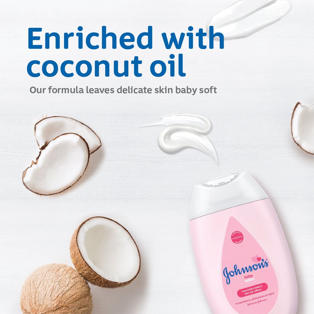 Johnson's baby lotion bottle with pink label, text 'Enriched with coconut oil' and coconut halves, highlighting the formula for delicate baby skin.