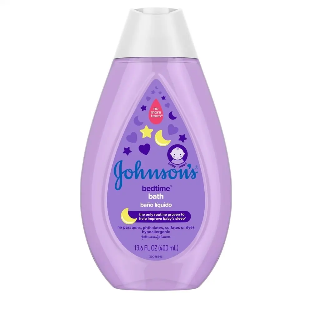 Johnsons Baby Bedtime Bath liquid soap, 13.6 FL OZ (400 ml), purple bottle with a moon and stars design, labeled as free from parabens, phthalates, sulfates, or dyes, and clinically proven to help baby sleep.