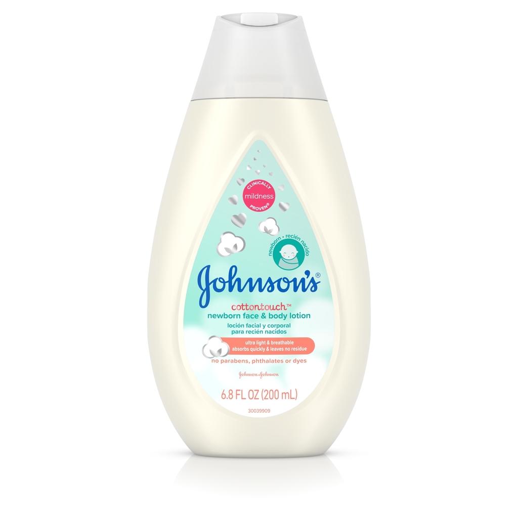 Pump bottle of Johnson's CottonTouch newborn face and body lotion, 6.8 FL OZ (200 mL), with pink and blue label and no parabens, phthalates, or dyes.