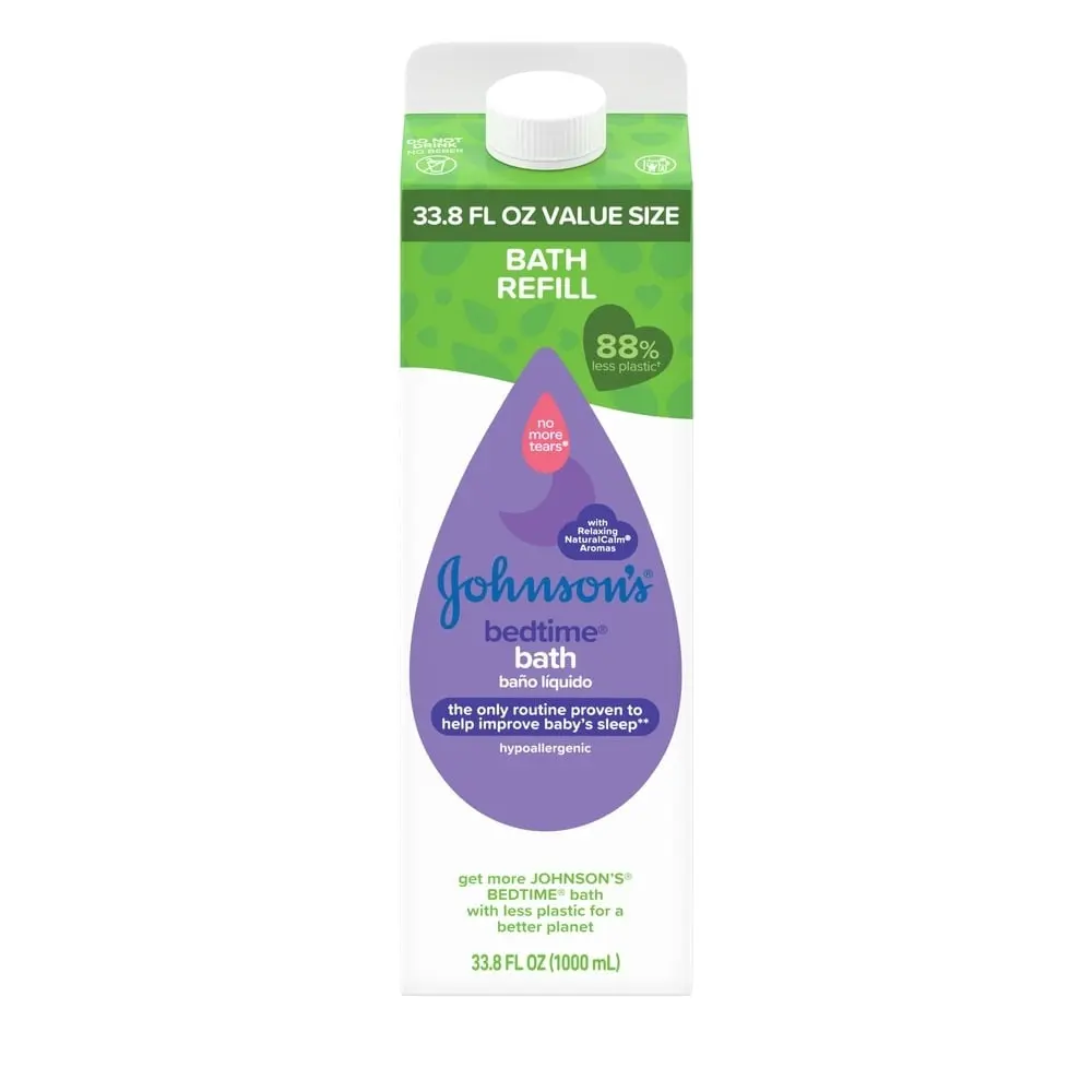 A rectangular carton labeled "33.8 FL OZ VALUE SIZE BATH REFILL Johnson's bedtime bath," displaying tear-drop graphics and copy emphasizing hypoallergenic and eco-friendly attributes.