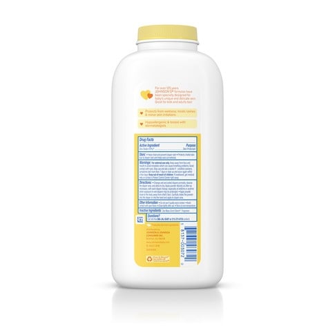 A white plastic bottle labeled “Johnson’s Baby Powder” with a yellow cap, is placed against a white background. The bottle features text detailing ingredients and usage instructions.