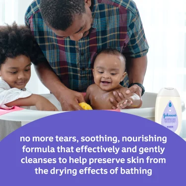 Father bathing baby with older sibling smiling beside them. Johnson's Baby product bottle on the side. Text reads: "no more tears, soothing, nourishing formula that effectively and gently cleanses to help preserve skin from the drying effects of bathing"