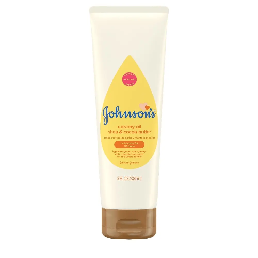 Johnson's Baby creamy oil shea & cocoa butter, 8 fl oz (236 mL) tube with brown cap, labeled as hypoallergenic and free from parabens, phthalates, and dyes.