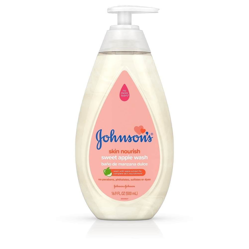 Pump bottle of Johnson's Skin Nourish sweet apple wash, 16.9 FL OZ (500 mL), with pink label and no parabens, phthalates, or dyes.