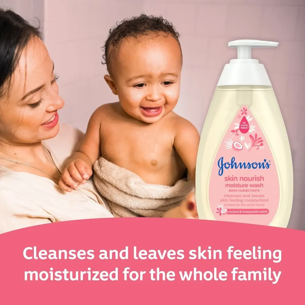 A mother holds a smiling, towel-wrapped baby in a bathroom; nearby is a bottle of Johnson's "skin nourish moisture wash." Text reads: "Cleanses and leaves skin feeling moisturized for the whole family."
