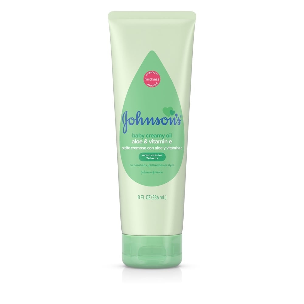 Johnsons Baby creamy oil with aloe and vitamin E, 8 fl oz (236 ml), in a green tube, labeled 'clinically mildness proven' and 'no parabens, phthalates, dyes.'