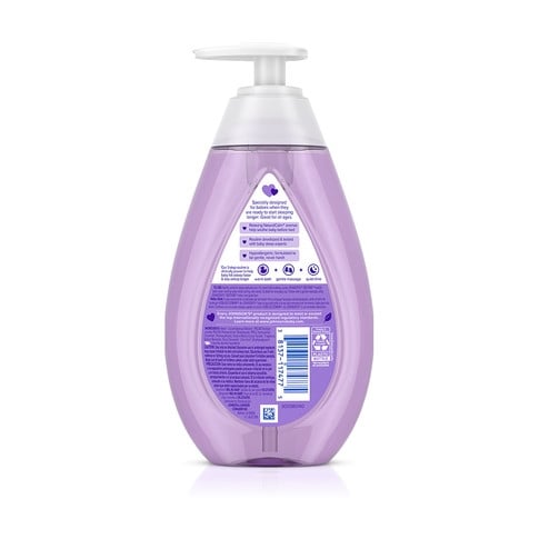 A purple plastic bottle with a pump dispenser contains baby shampoo by Johnson's, labeled "soothing lavender" and "no more tears." The background is plain white.