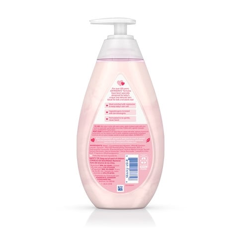 Translucent pink bottle of Johnson's Baby Lotion with a pump top on a white background. Text on the bottle includes "Johnson’s Baby Lotion", "Clinically Proven Mildness", "No Parabens, Phthalates, or Dyes".