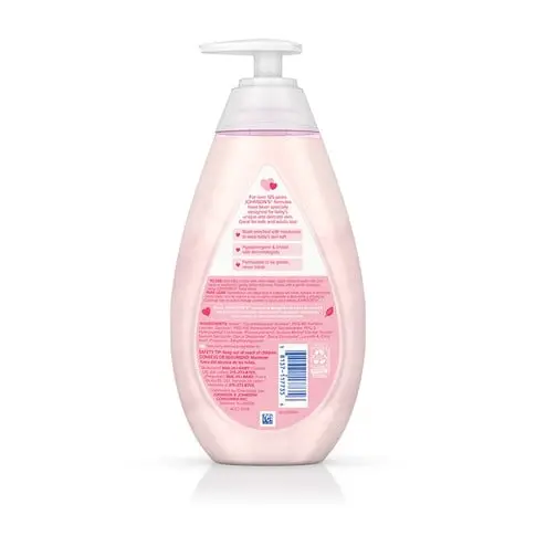 Translucent pink bottle of Johnson's Baby Lotion with a pump top on a white background. Text on the bottle includes "Johnson’s Baby Lotion", "Clinically Proven Mildness", "No Parabens, Phthalates, or Dyes".