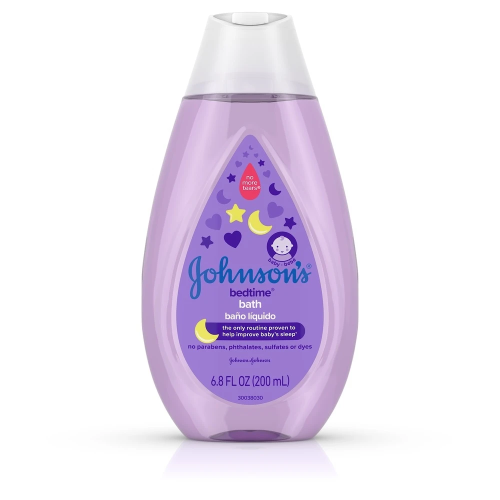 Johnson's Bedtime Bath liquid bottle in purple packaging, with text indicating it is free of parabens, phthalates, sulfates, or dyes, and helps improve baby's sleep, 6.8 FL OZ (200 mL).