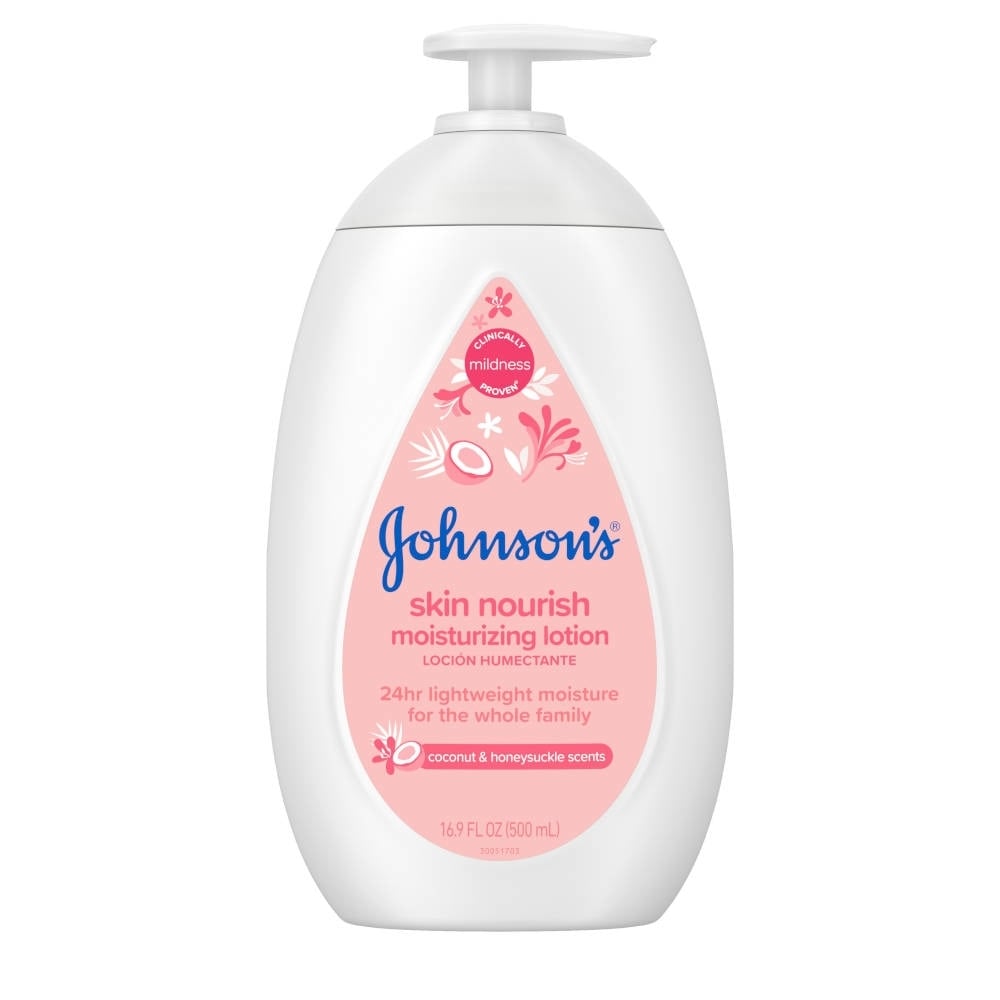 A White bottle with a pump dispenser containing Johnson’s Skin Nourish Moisturizing Lotion with coconut and honeysuckle scents. Pink label reads: "Clinically proven mildness, 24hr lightweight moisture for the whole family, 16.9 FL OZ (500 mL)."