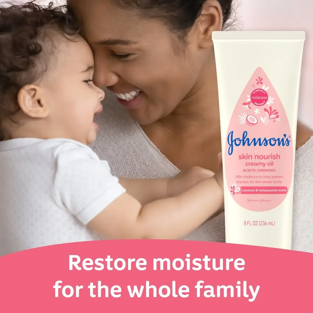 A mother and baby face each other, smiling. A Johnson's skin nourish creamy oil bottle with coconut and honeysuckle scents appears prominently. Text reads: "Restore moisture for the whole family."