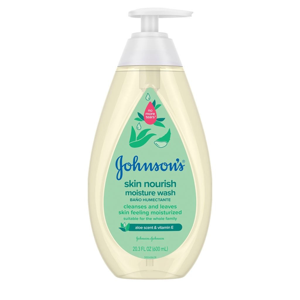 A clear plastic bottle labeled "Johnson's Skin Nourish Moisture Wash," featuring a pink flower graphic and pump dispenser, stands against a white background. The label text highlights shea and cocoa butter ingredients.