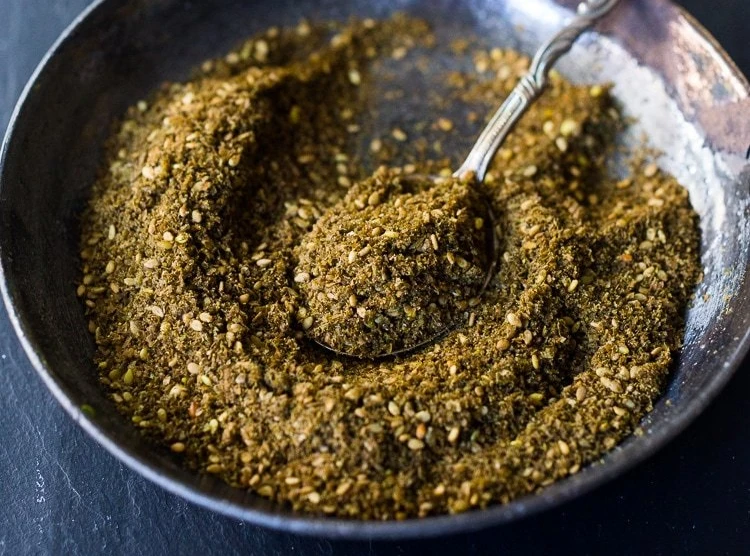 https://images.ctfassets.net/3vz37y2qhojh/2BpXxfIIIwlcUlMyzmtkNa/2c276f5889ceae5eb083a3cfcd856f77/zaatar-spice-recipe-100-hero.jpg?w=750&fit=fill&fm=webp