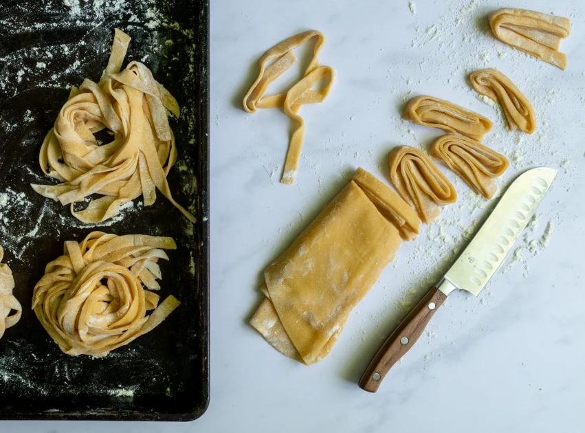 Home Made Pasta by Pasta Maker. an Indifinited Man Cutting the Rigatoni  Stock Image - Image of dinnertime, uncooked: 154064293