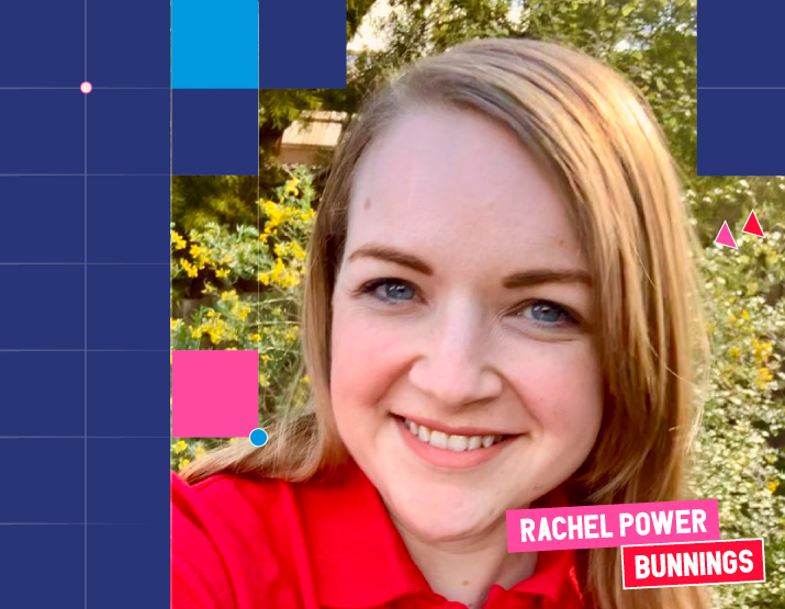 A brightly lit photograph of Rachel Power, a Caucasian woman with blonde hair wearing a red collared shirt and standing outside in front of a bush. She is smiling direct to camera. She has blue eyes which contrast the background, as the greenery behind her is flowering with white & yellow flowers. Square Graphic elements border the image, and across the bottom right of the image, her name is included in block letters against a pink background. Underneath her name, BUNNINGS is written in white block letters against a red background.