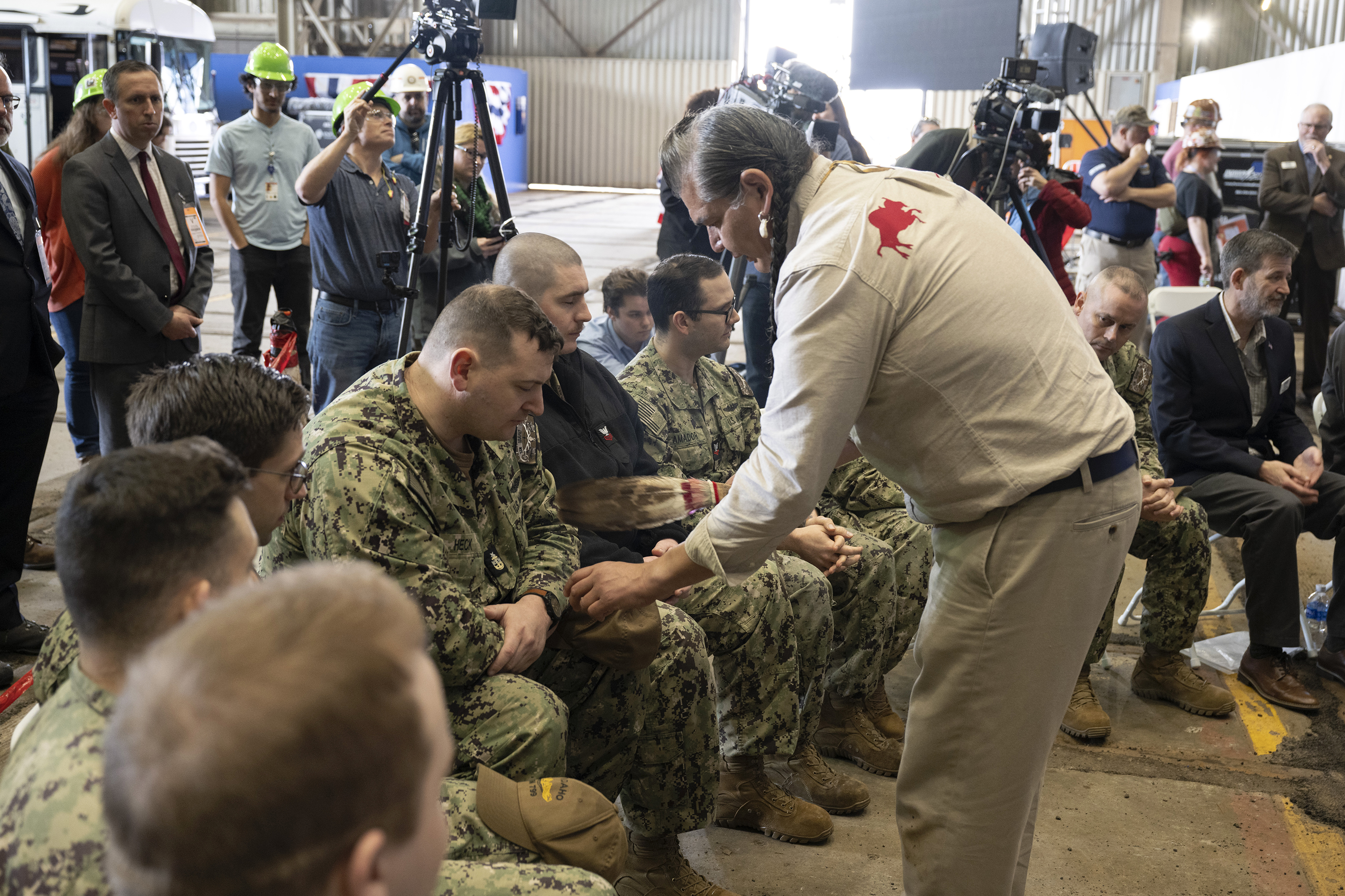 Nez Perce Vice Elder Brooklyn Baptiste blesses and purifies crewmembers