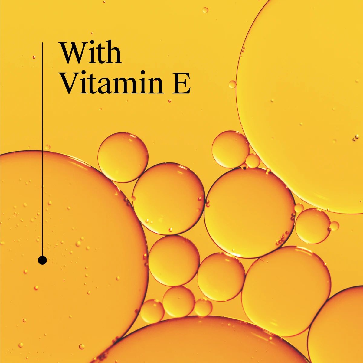 With Vitamin E over golden oil bubbles background