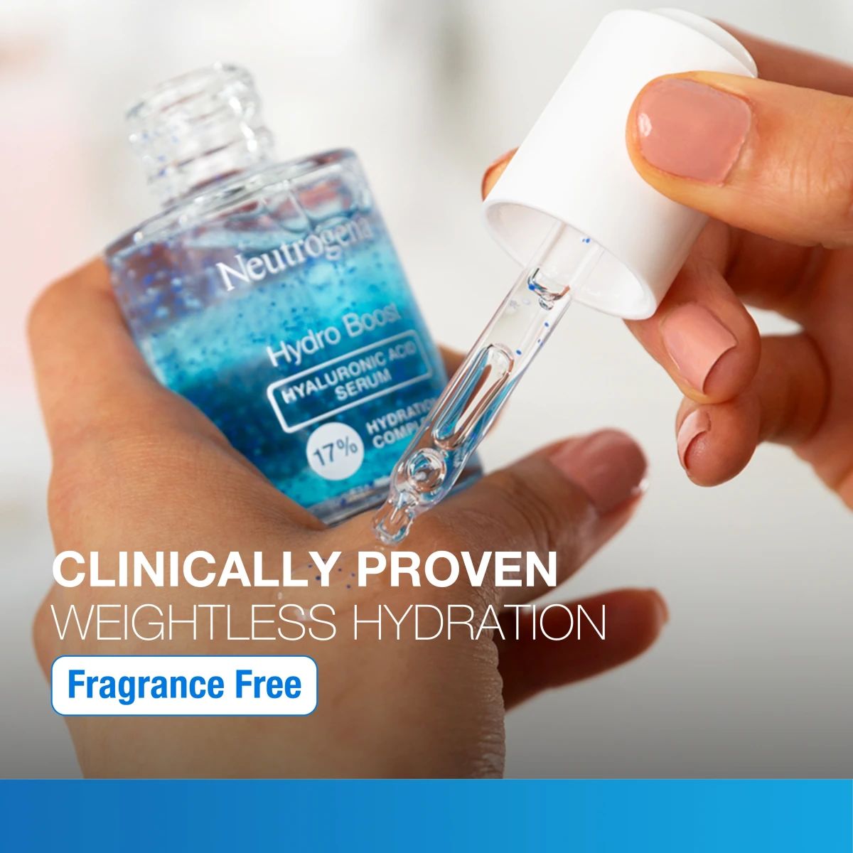 Hand holding Neutrogena® Hydro Boost dropper for weightless hydration and fragrance free claim
