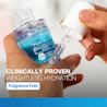 Hand holding Neutrogena® Hydro Boost dropper for weightless hydration and fragrance free claim