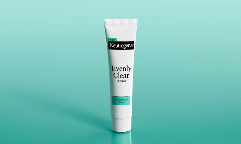 Neutrogena® Evenly Clear™ Facial Retinoid packaging against a teal background