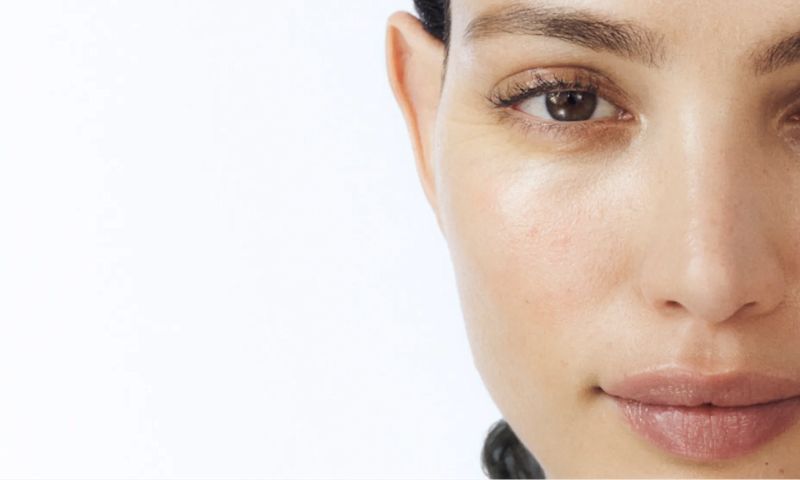 Woman with healthy wrinkle-free skin after using Neutrogena® Anti-Aging Duo