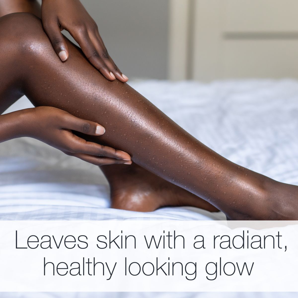 Neutrogena® Body Oil bottle; Leaves skin with a radiant, healthy looking glow