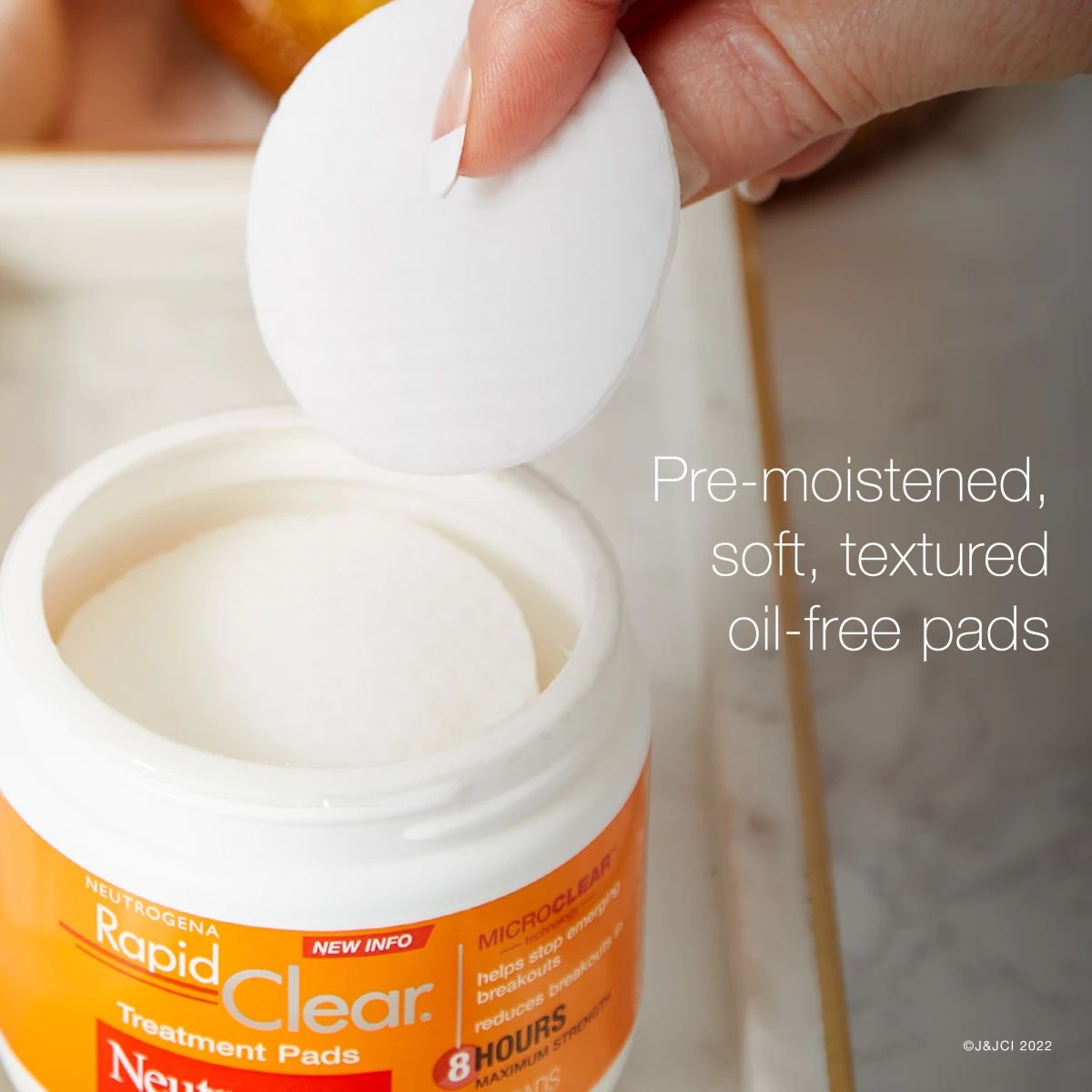 Neutrogena® Rapid Clear pre-moistened, soft, textured oil-free treatment pads
