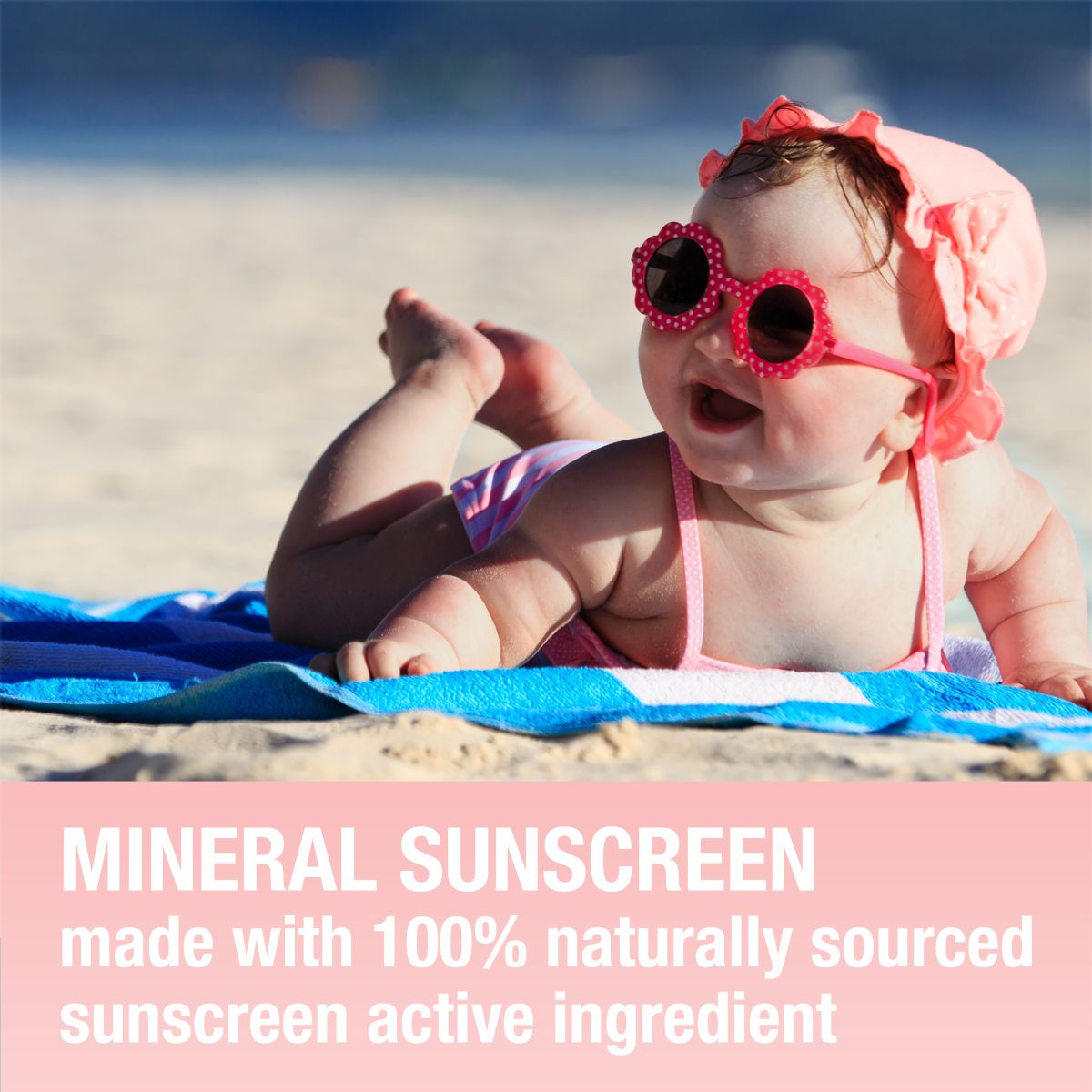 Baby on beach; MINERAL SUNSCREEN made with 100% naturally sourced active ingredient