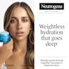 Woman holding Neutrogena® Hydro Boost jar with weightless hydration goes deep claim.