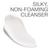 Neutrogena® Makeup Melting cleanser creamy white swatch accompanied by the text "SILKY, NON-FOAMING CLEANSER."