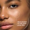 Closeup of model with oily acne prone skin highlighted as ideal cleanser.