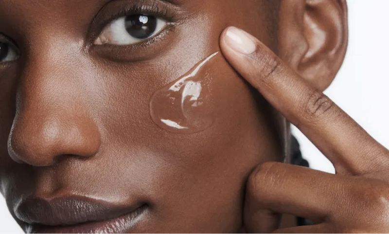 Woman with normal skin applying Neutrogena® Hydro Boost Water Gel
