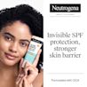 Person holding Neutrogena® Ultra Gentle SPF 30 moisturizer with Invisible SPF, CICA formula.