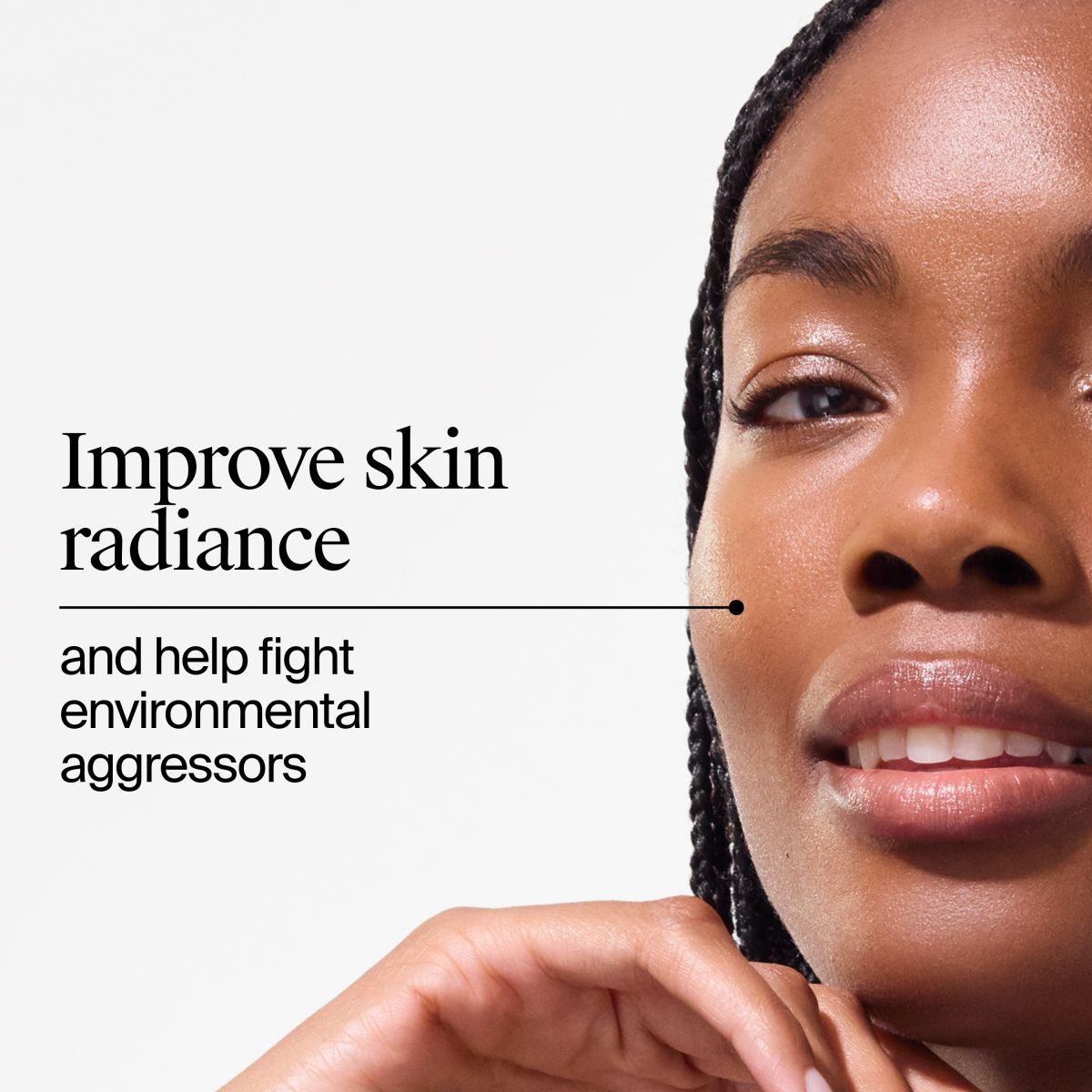Smiling person with braided hair and radiant skin promotes radiance and defense against aggressors