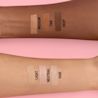 Arm swatches labeled fair, neutral, light, medium, tan, deep on pink background