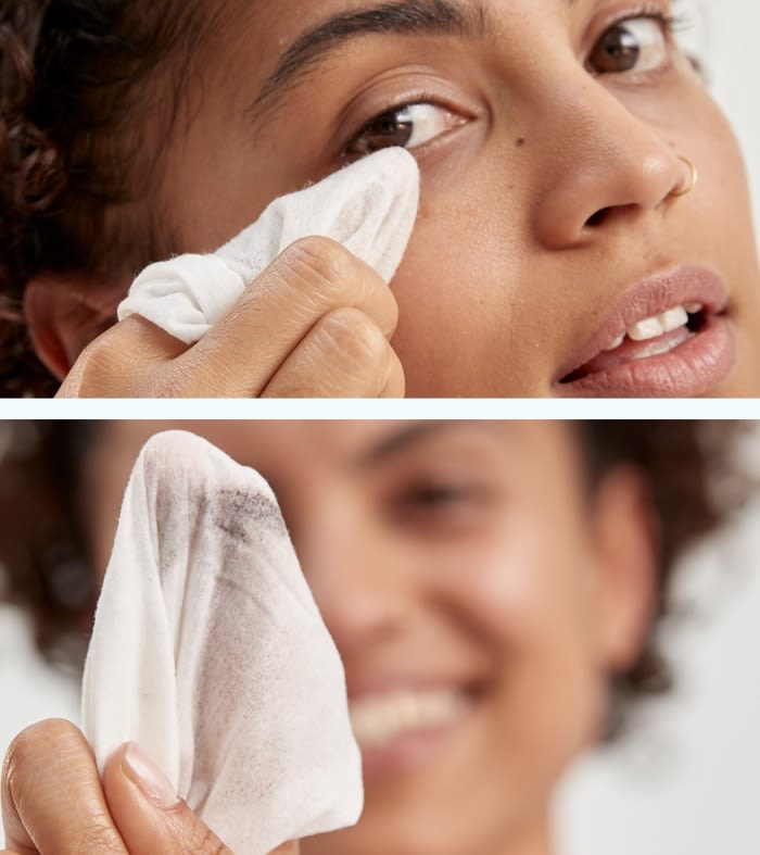 Woman showing how easily Neutrogena’s makeup remover cleansing wipes can remove makeup.