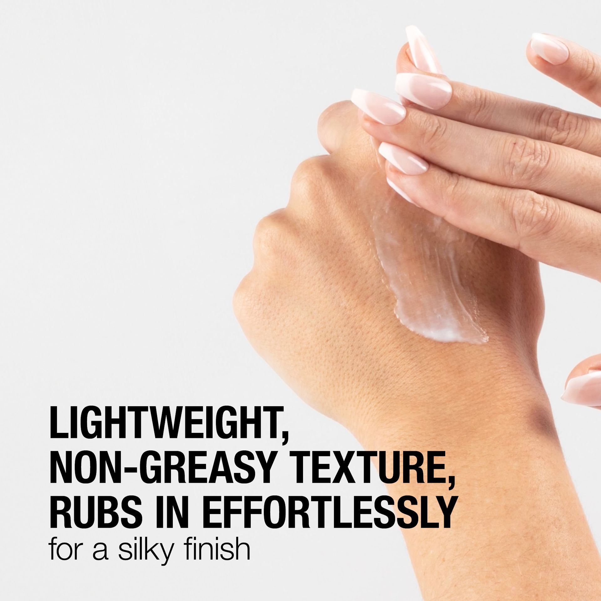 241219 411NTG UG Moisturiser Digital CA EN ML-02 A woman samples face moisturizer on her hand.