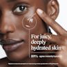 Woman rubbing Hydroboost gel cleanser on face, for juicy instantly hydrated skin. 89% agree instantly hydrated*