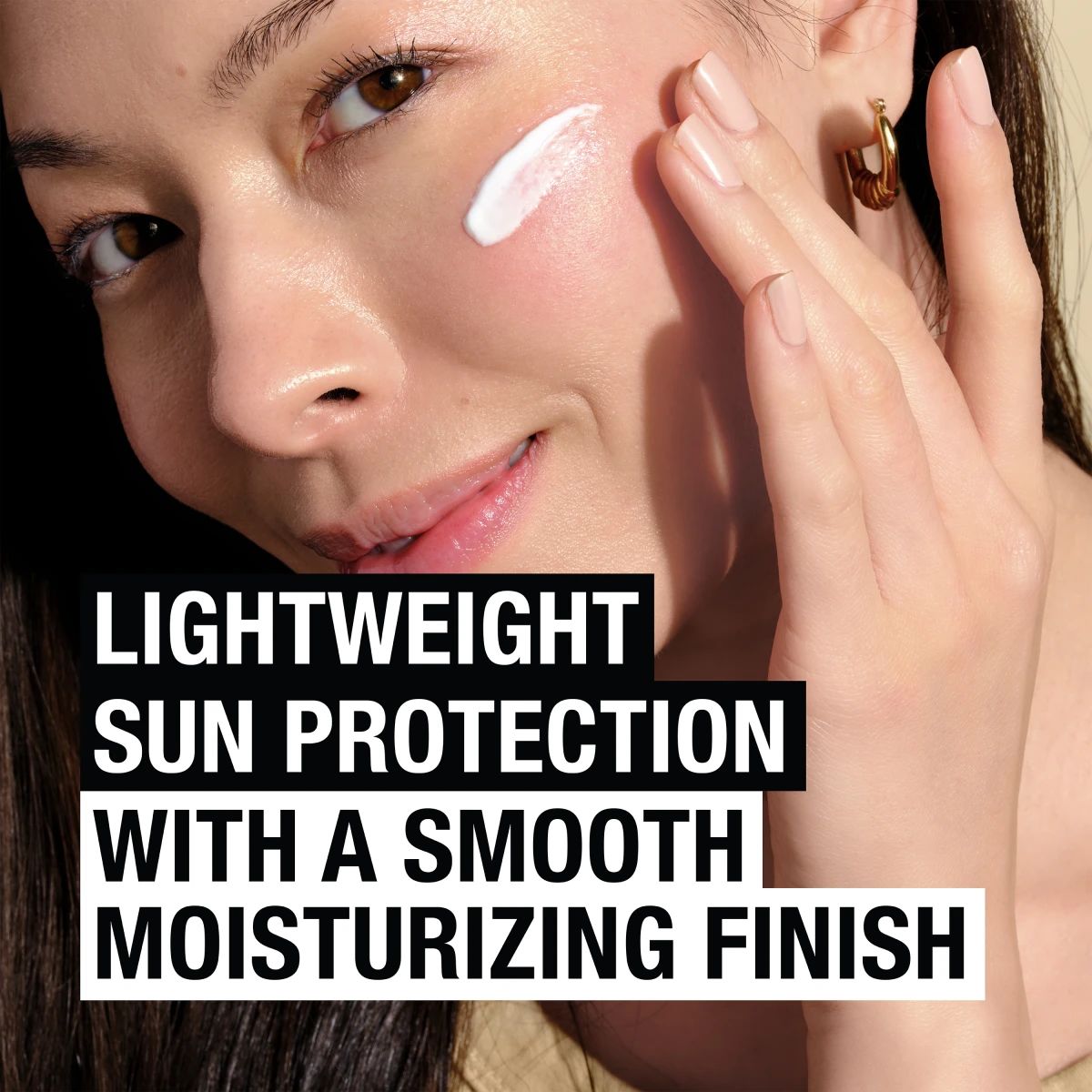 Woman applying Neutrogena® Ultra Sheer® SPF 60+ serum with smooth moisturizing finish