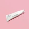 A tube of Neutrogena® Lip Plumping Serum applicator set against a solid pink background.