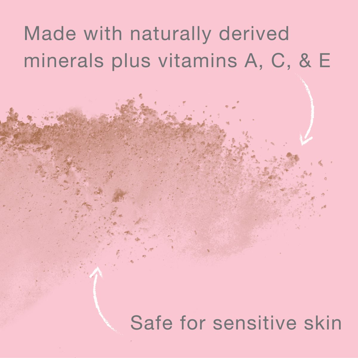 Scattered mineral powder with vitamins A, C, E on pink background safe for sensitive skin